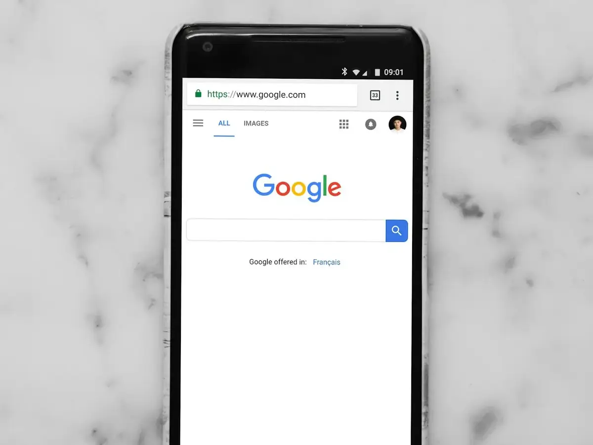 A phone open on the Google search page